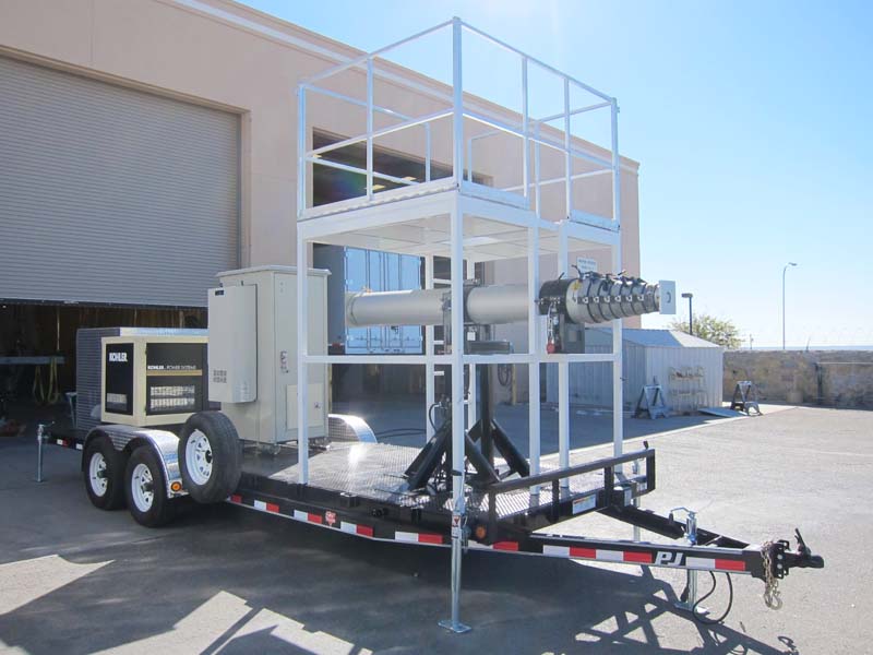 A mobile tower trailer with different pieces of equipment