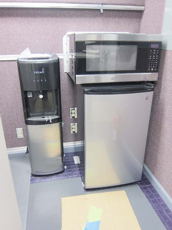 A refrigerator, a water dispenser, and an oven