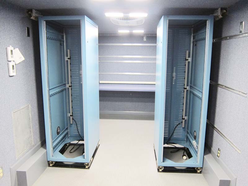 Two metal cabinets painted in blue