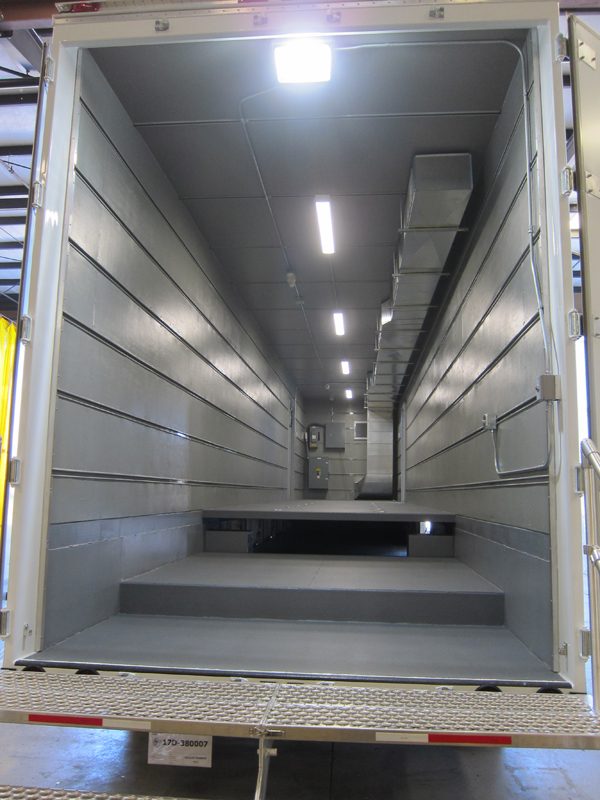 A trailer with mostly gray interior