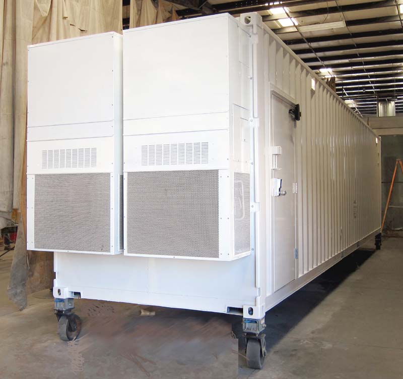 A white movable trailer inside the garage